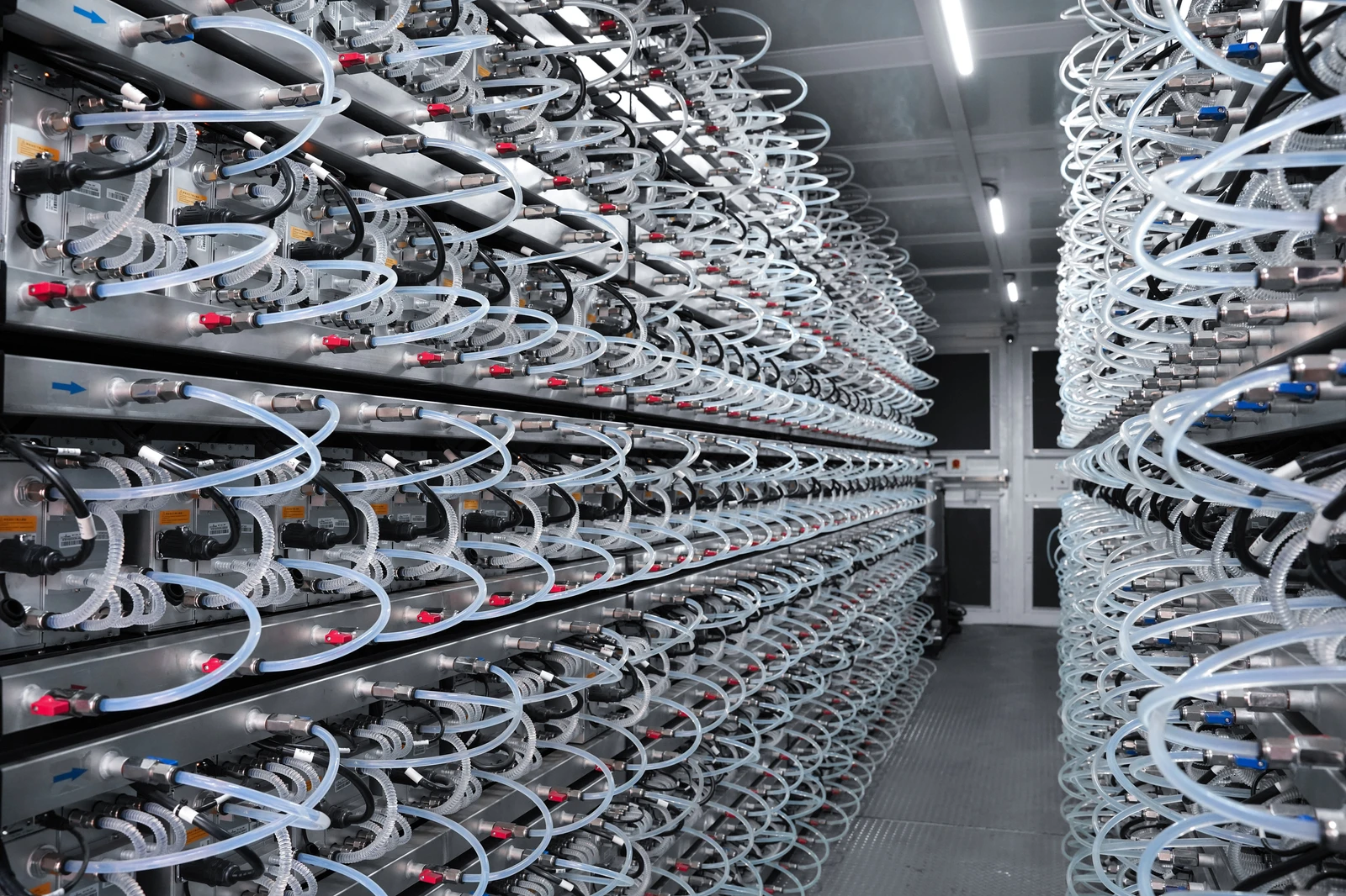 A service aisle between rows of hydro miners